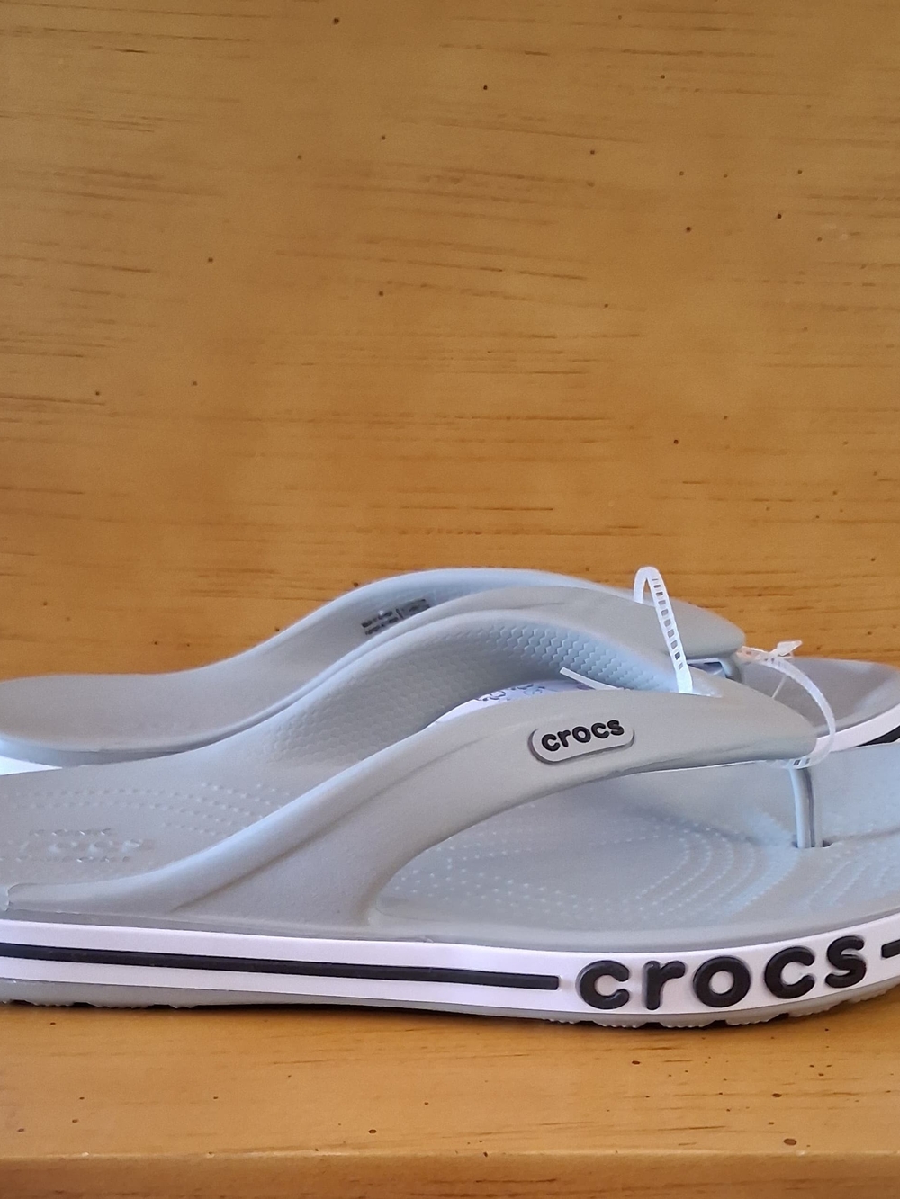 Crocs Women's Light Gray Flip Flop Sandals